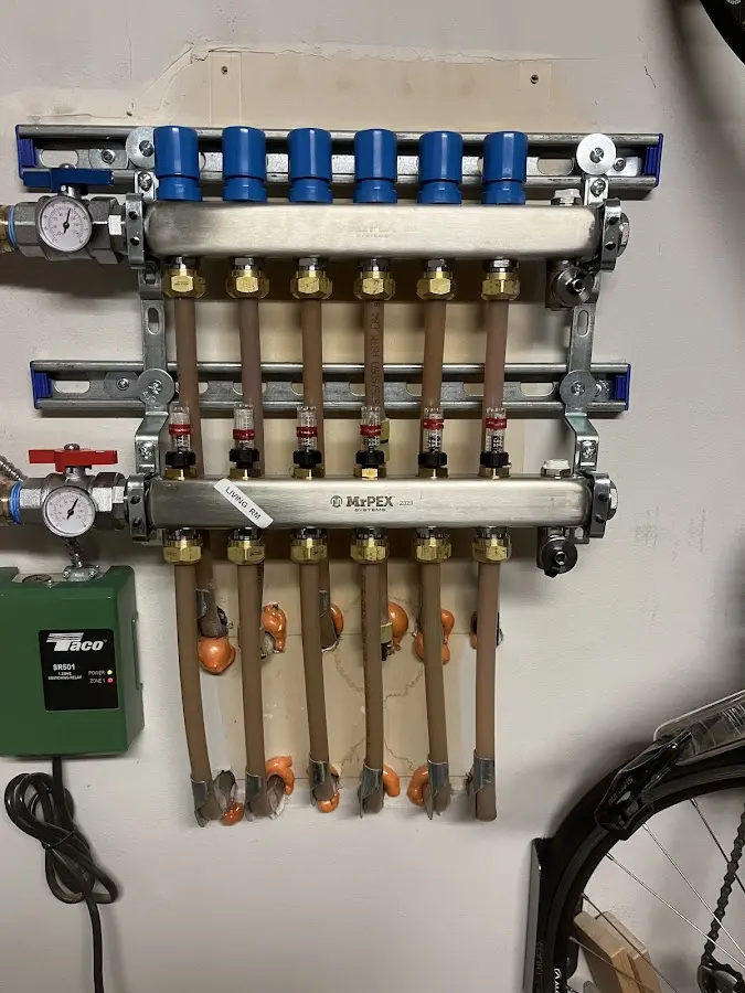 Plumber performing Gas Line Installation at a residential property in Louisburg